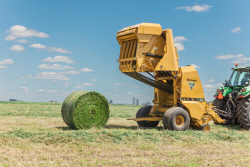 A Vermeer Pro G4 baler ejects a silage bale.